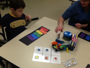 We glued the rainbow colors on a black strip of paper. I then put a variety of materials and colors (pom poms, pipe cleaners, beads, tissue paper etc.) and the students glued the materials to the matching color strip. 